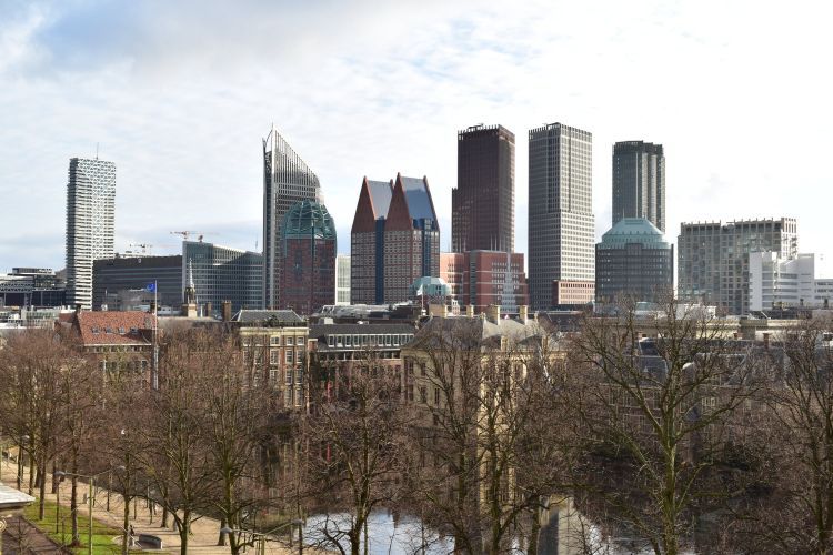Skyline Den Haag Magisch Spreker Gerard du Buf Magische lezing werkgeluk leiderschap